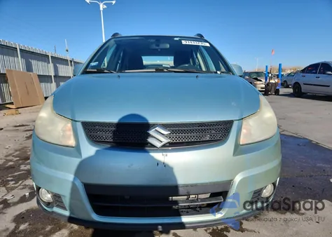 2009 Suzuki Sx4 Touring z USA, uszkodzony, nr VIN JS2YB417X96202988